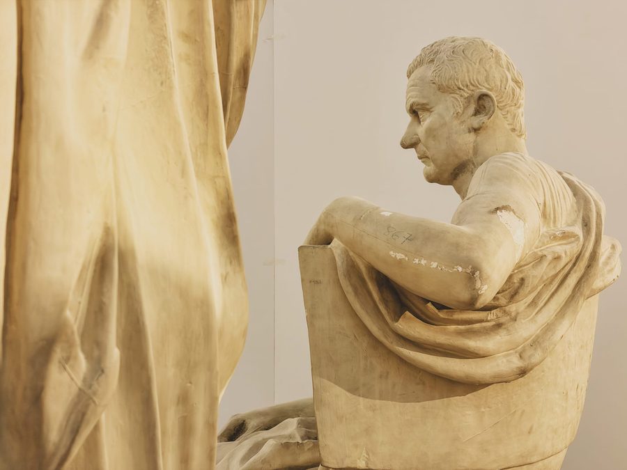 A statue of a sitting man.