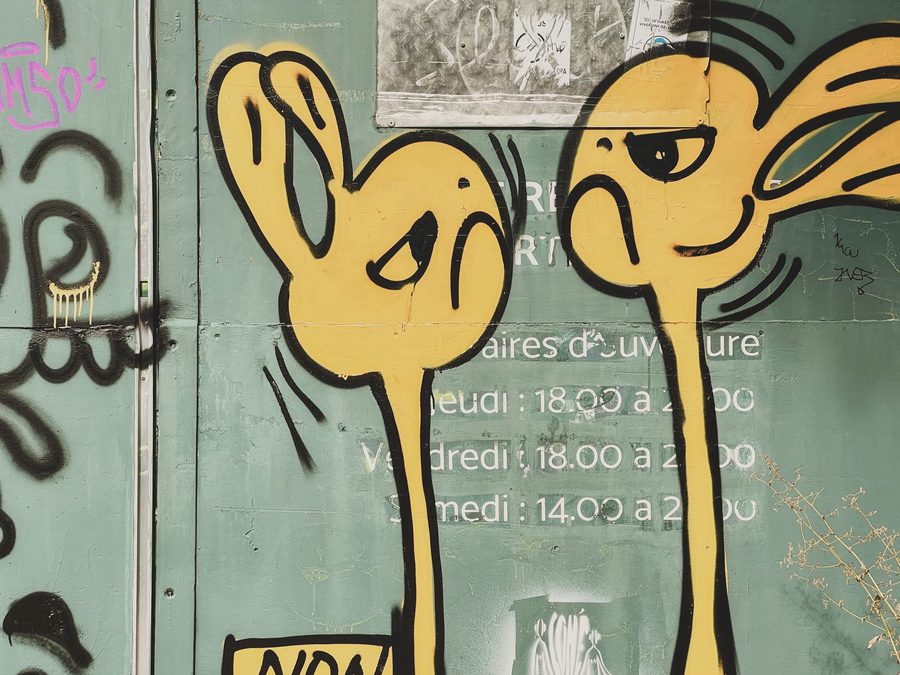 A weird graffiti of two yellow lamas (?).