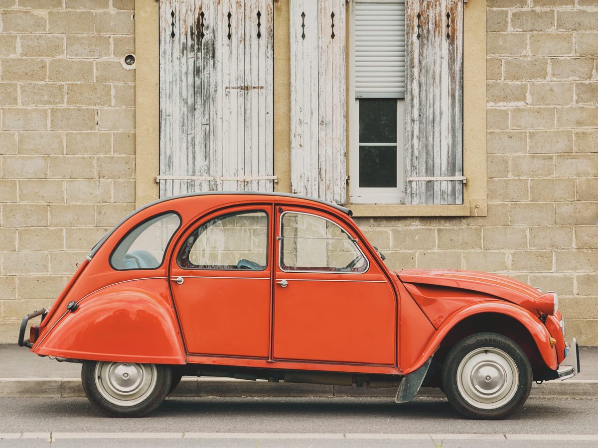 A red Citroën 2CV. Image Anthony Nelzin-Santos.