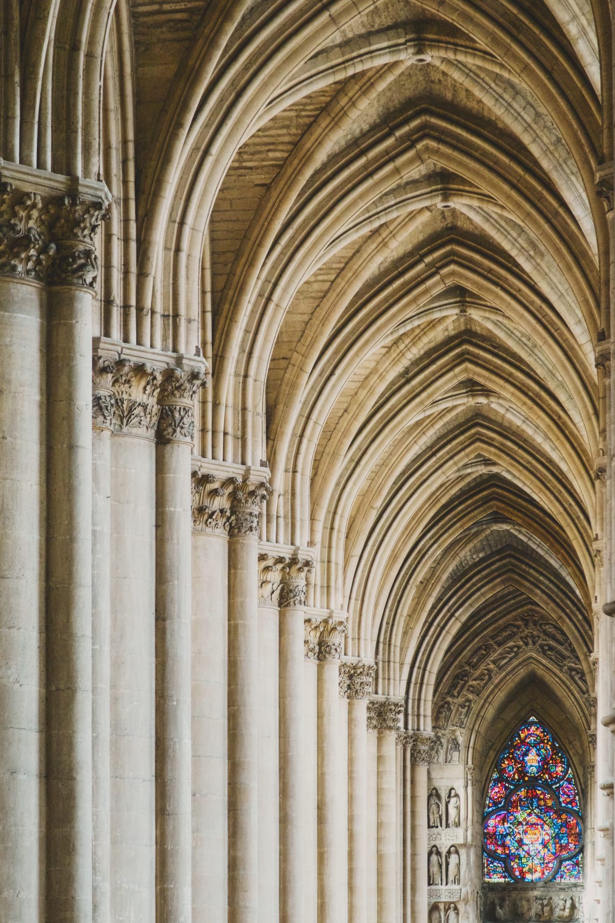 A stained glass window in the cathedral of Reims. Image Anthony Nelzin-Santos.
