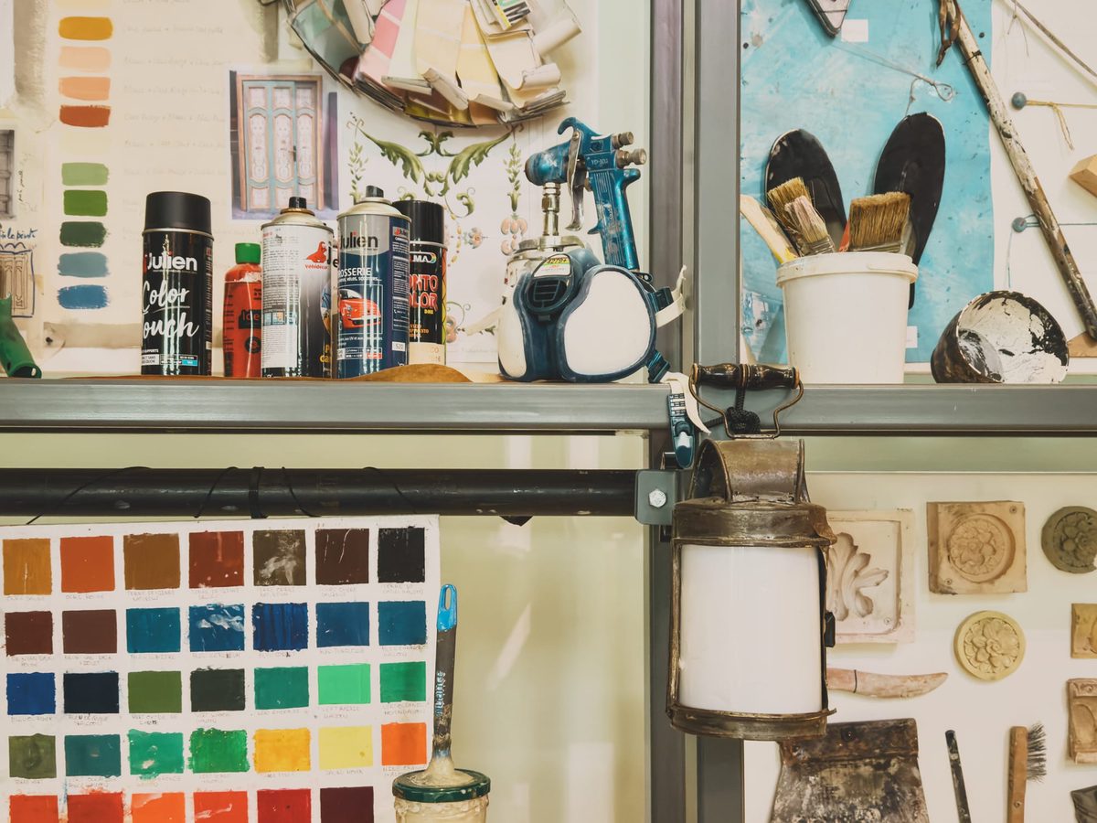 An assortment of colour swatches and paints on shelves. Image Anthony Nelzin-Santos.